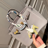 Close-up detail of curated bag design