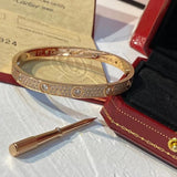Close-up detail view of Cartier unisex jewelry piece