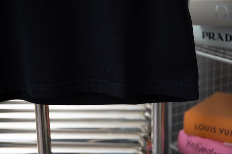 Flat lay presentation of Louis Vuitton cotton t-shirt with signature branding