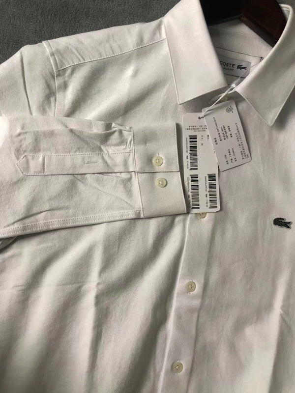 Close-up detail shot of Lacoste luxury clothing with monogram-inspired silhouette