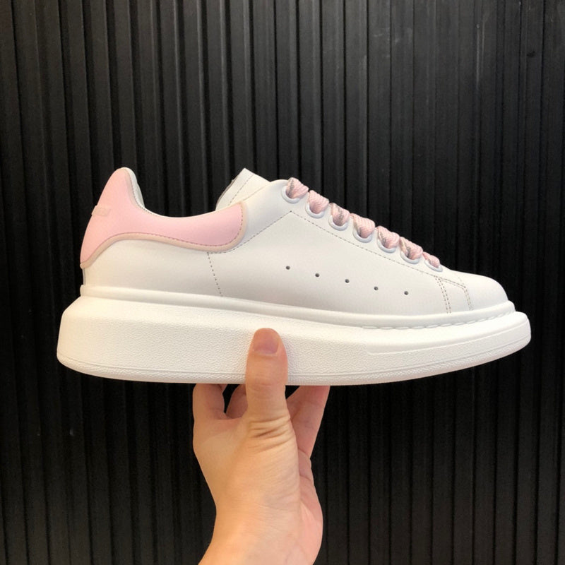 Alexander McQueen Luxury sneakers in clean off-white premium leather build front view