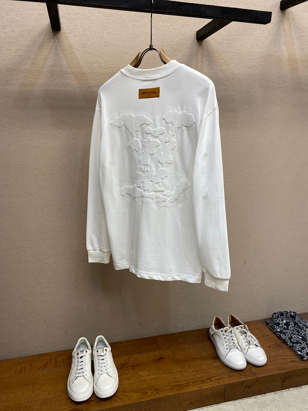Side profile of Louis Vuitton luxury clothing with runway-inspired design