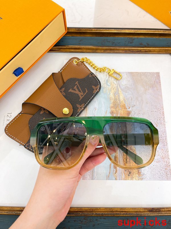 Close-up detail view of Louis Vuitton unisex sunglasses