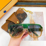 Close-up detail view of Louis Vuitton unisex sunglasses