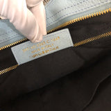 Side profile of statement chic women's handbag – women's statement bag
