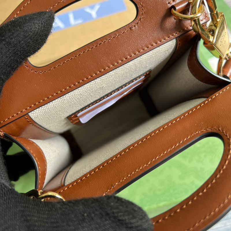 Side view of fluid structured handbag