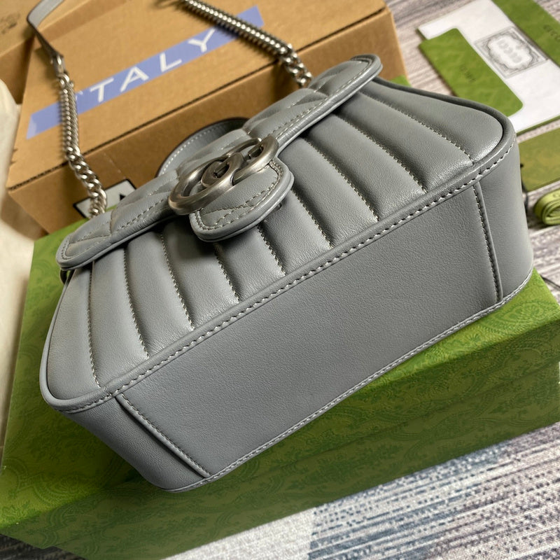 Styled lifestyle shot of statement polished women's handbag – women's luxury accessory