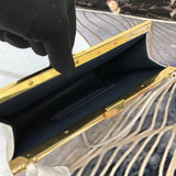 Side profile of refined modern women's handbag – women's luxury handbag