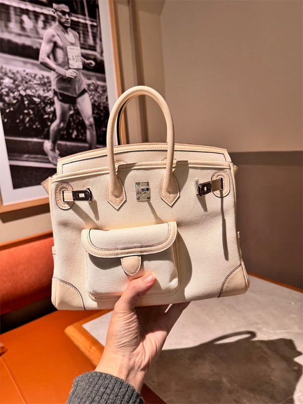 Side view of effortless structured handbag
