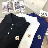 Close-up detail shot of Moncler luxury clothing with signature branding