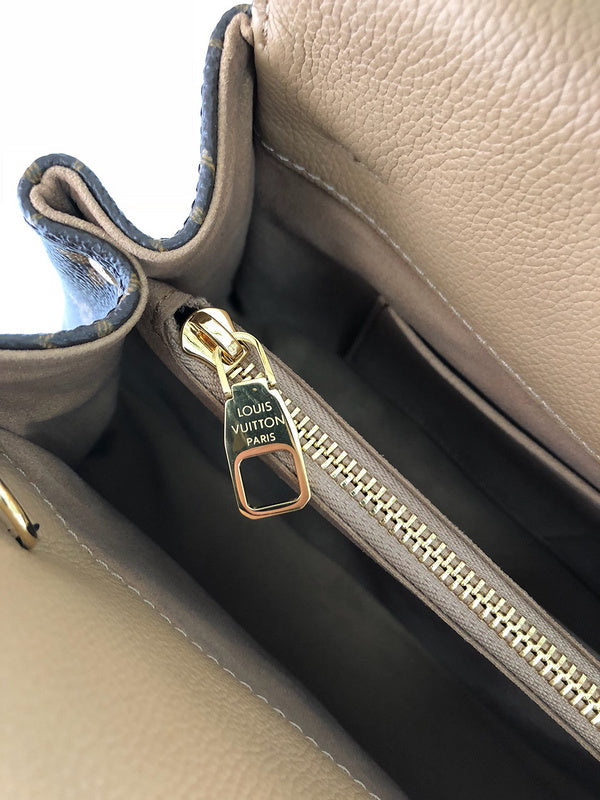 Front view of chic signature women's handbag – women's luxury handbag