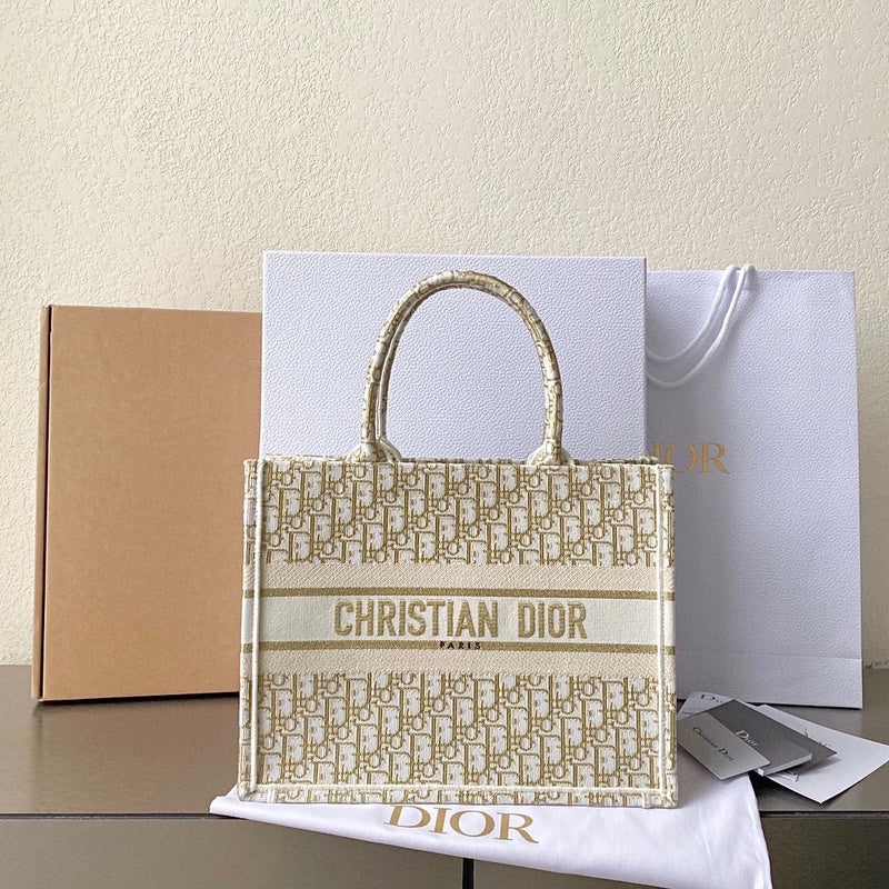 Side profile of structured signature women's handbag – women's designer-style accessory
