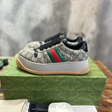 Gucci two-tone luxury sneakers view 4 sleek tonal finish