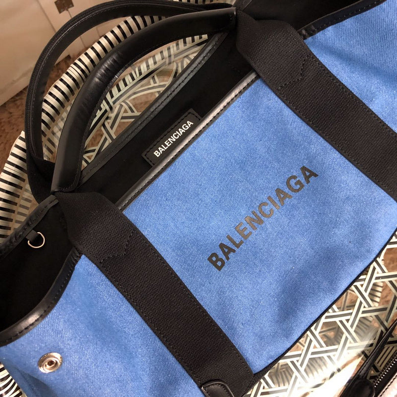 Styled lifestyle shot of premium classic women's handbag – women's statement bag