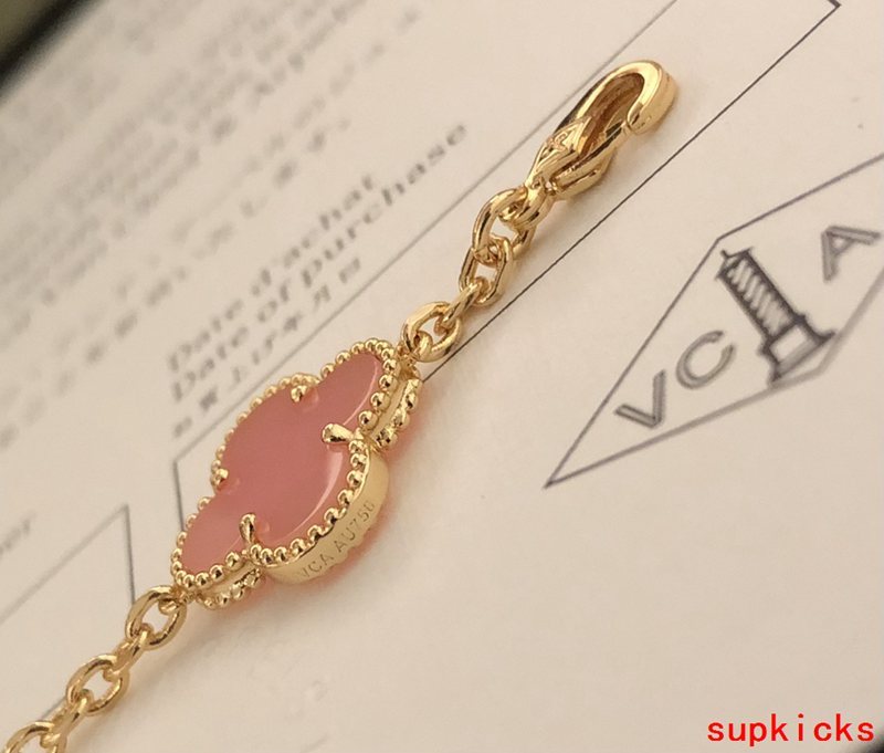 Lifestyle view of Van Cleef & Arpels unisex jewelry piece
