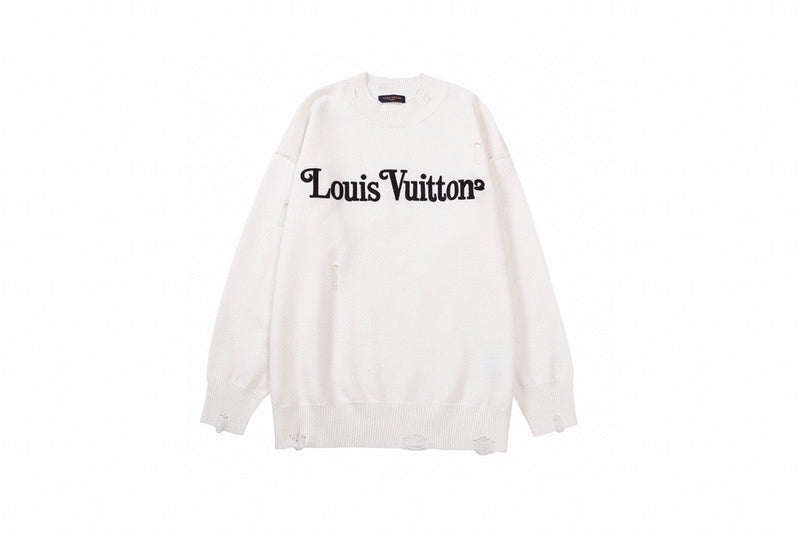 Close-up detail shot of Louis Vuitton luxury clothing with label-forward styling