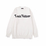 Close-up detail shot of Louis Vuitton luxury clothing with label-forward styling