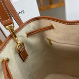 Styled lifestyle shot of modern everyday-luxe women's handbag – women's luxury handbag