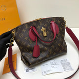 Side profile of sleek classic women's handbag – women's premium purse