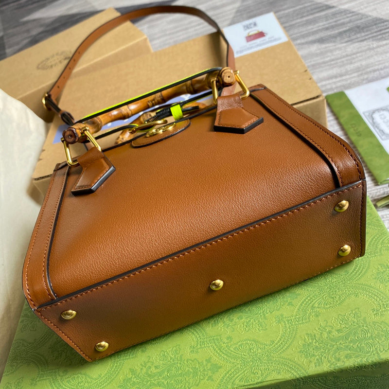 Handle and strap detail of statement classic women's handbag – women's statement bag