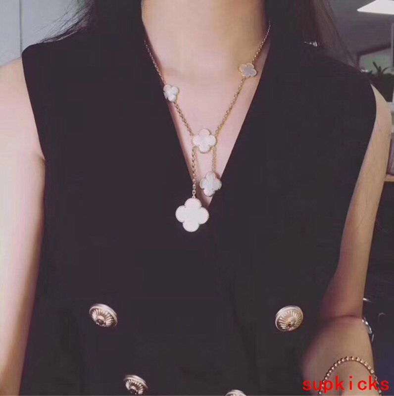 Lifestyle view of Van Cleef & Arpels unisex jewelry piece