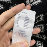 Side profile of Louis Vuitton luxury clothing with logo-detail design