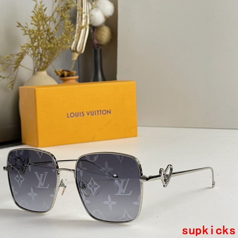 Close-up detail view of Louis Vuitton unisex sunglasses