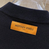 Front view of Louis Vuitton luxury clothing with streetwear-inspired cut