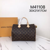 Front view of signature polished women's handbag – women's luxury handbag