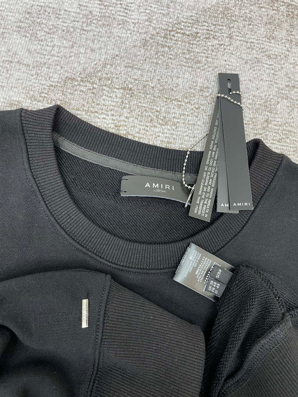 Texture and finish detail of Amiri luxury piece style No.056