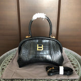 Front view of modern chic women's handbag – women's designer-style accessory