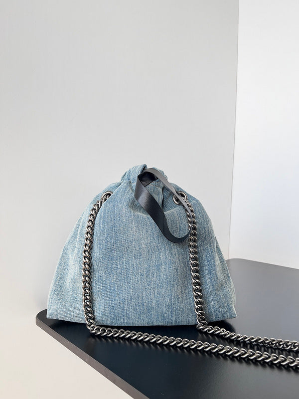 Zivas Charm Refined Structure Statement Handbag (Signature Shape & Finish) – Lifestyle Shot