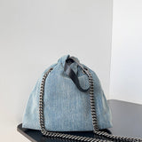 Zivas Charm Refined Structure Statement Handbag (Signature Shape & Finish) – Lifestyle Shot