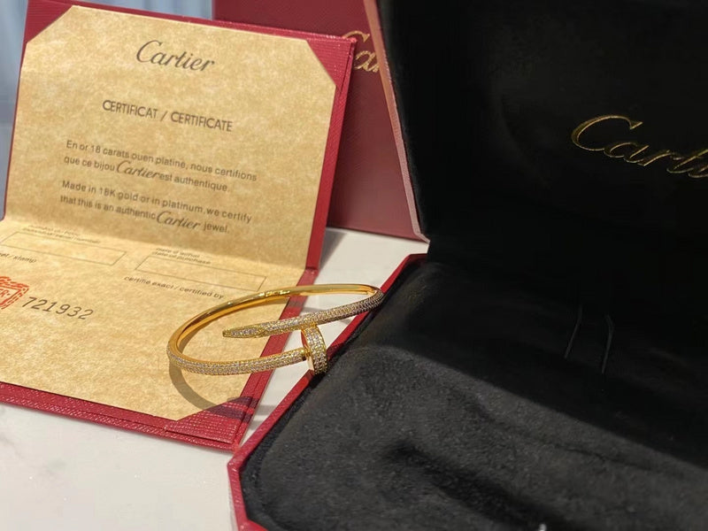 Front view of Cartier unisex jewelry piece