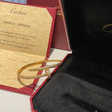 Front view of Cartier unisex jewelry piece