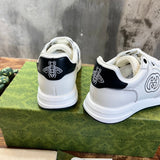 Gucci tonal black luxury sneakers view 10 classic court silhouette