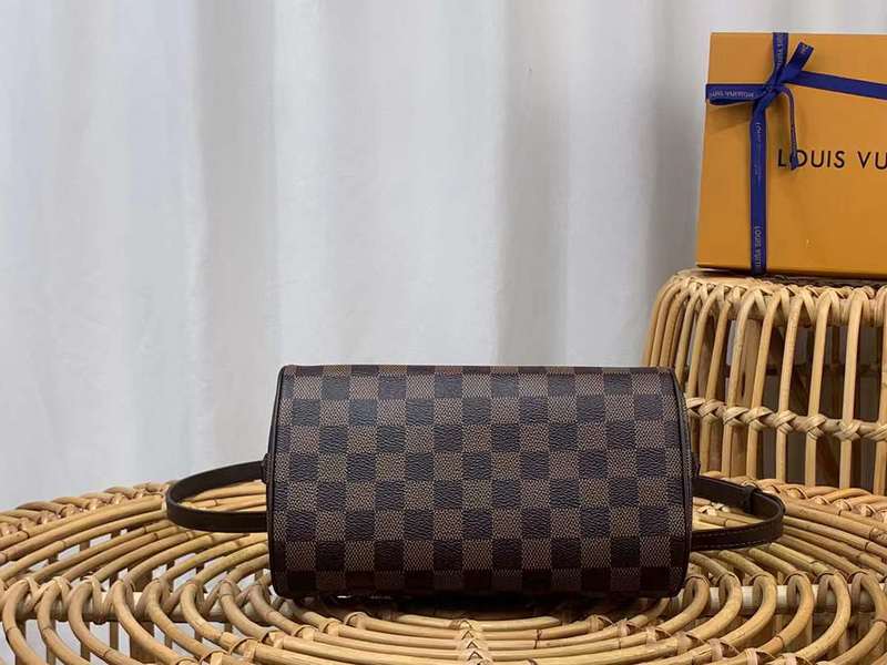 Styled lifestyle shot of elevated polished women's handbag – women's luxury accessory