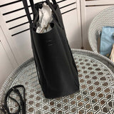 Top view of polished chic women's handbag – women's designer-style accessory