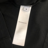 Side profile of Givenchy luxury clothing with tailored silhouette