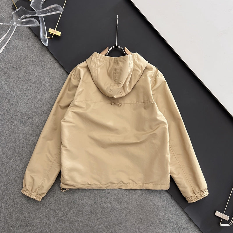 Flat lay presentation of Louis Vuitton luxury clothing with tailored silhouette