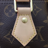Styled lifestyle shot of signature statement women's handbag – women's luxury accessory
