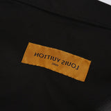 Back view of Louis Vuitton luxury clothing with monogram-inspired silhouette