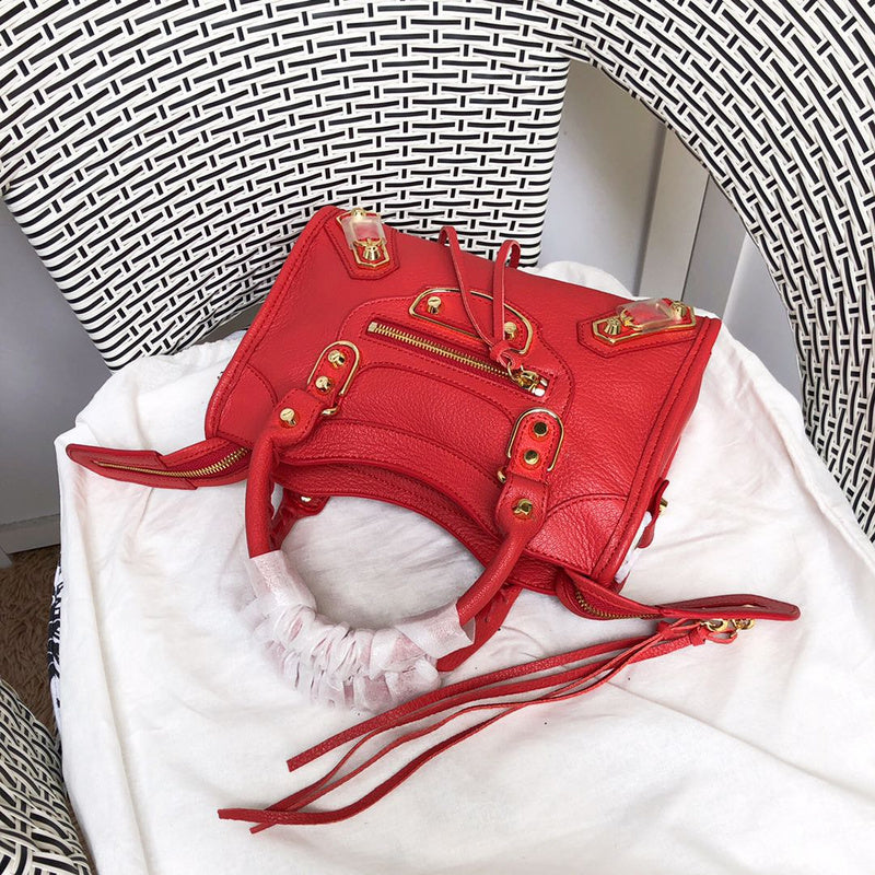 Styled lifestyle shot of classic structured women's handbag – women's statement bag