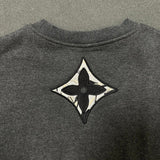 Side profile of Louis Vuitton luxury clothing with logo-detail design