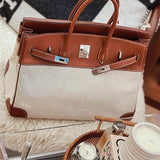Side view of refined structured handbag