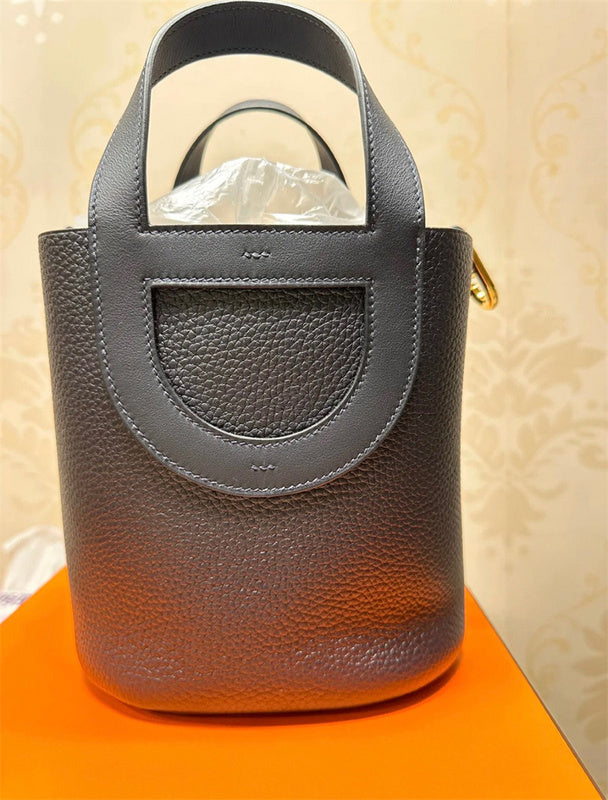 Side view of clean-lined structured handbag