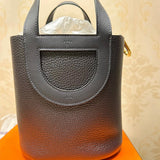 Side view of clean-lined structured handbag