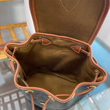 Side profile of refined modern women's handbag – women's luxury accessory