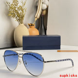 Close-up detail view of Louis Vuitton unisex sunglasses