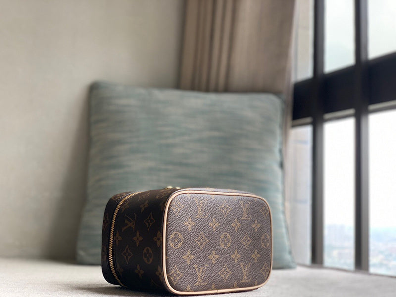  Sophisticated top-handle bag carried on shoulder